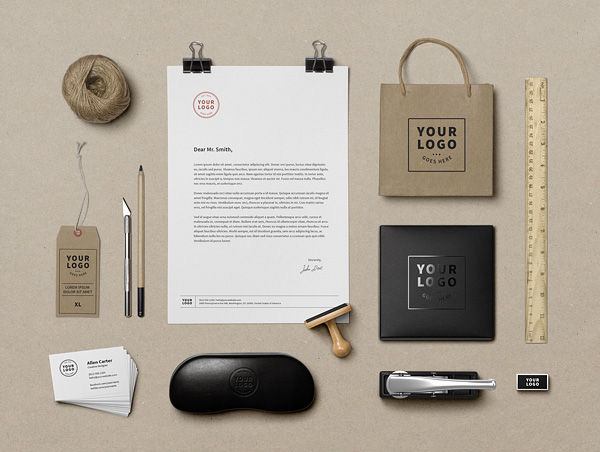 A vibrant display of various branding identity mockup templates including business cards and stationery in a modern office setting.